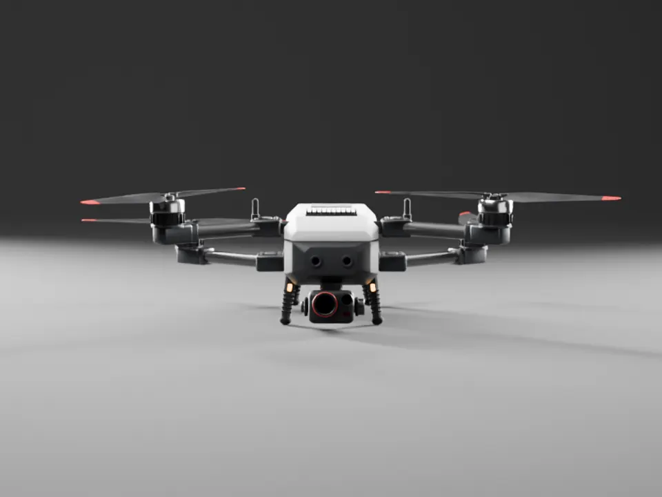 The first Terne draft: a boxy white body on dark rugged arms, front view in a grey studio.
